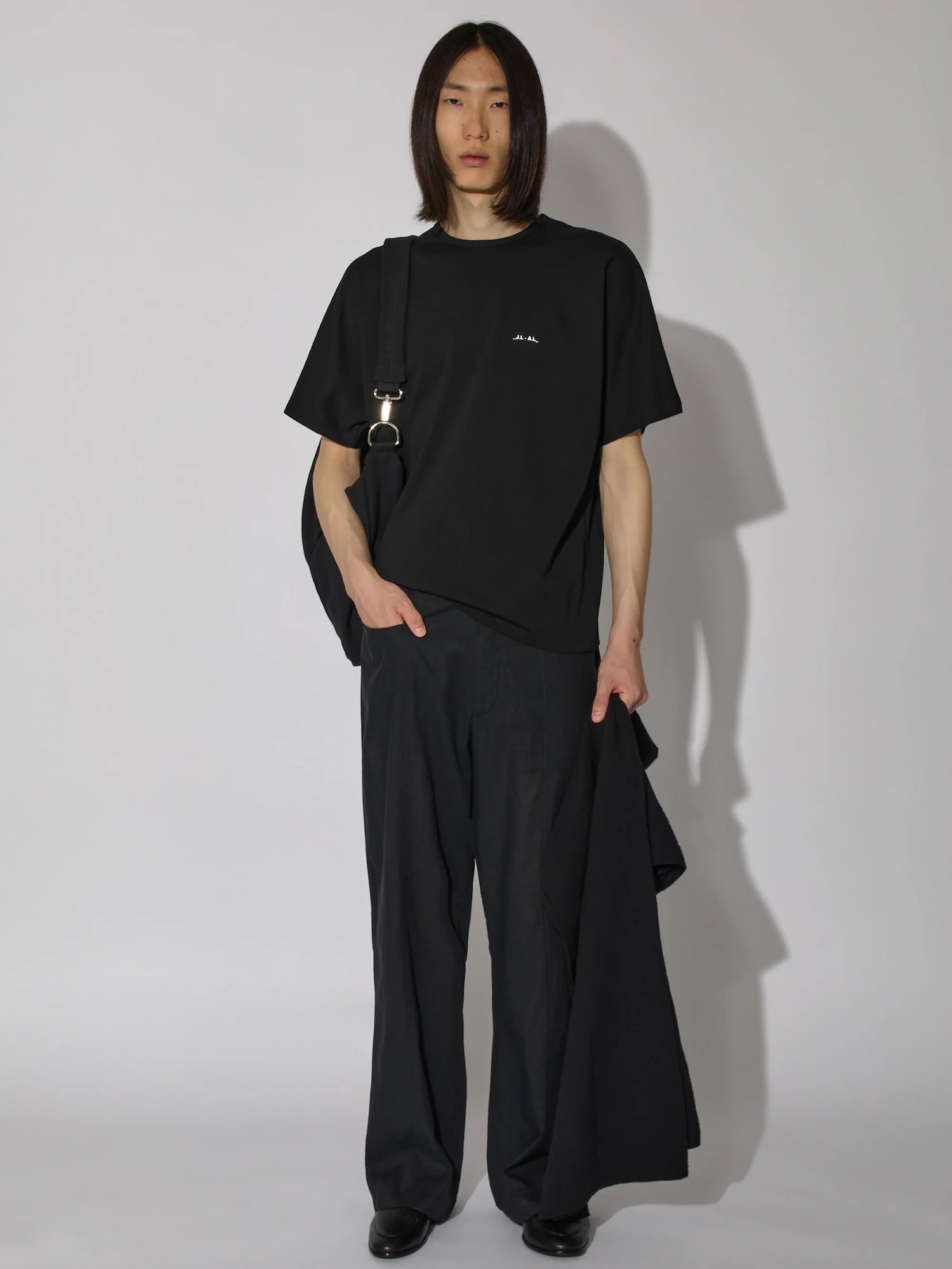 _J.LA.L_ / Dalma Tshirt Shungite Black - Road Sign